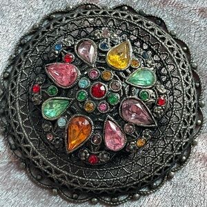 Beautiful multicolored brooch.